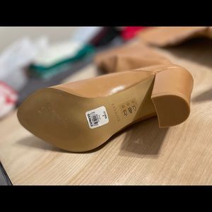 Woman’s Express knee high heeled boots